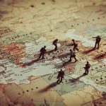 Toy soldiers on a map.