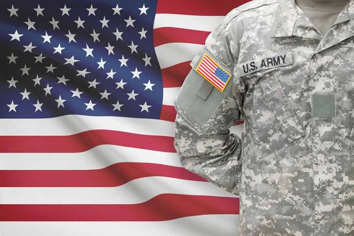 247938520 featured image US soldier in camouflage uniform with American flag
