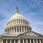 US Capitol Building with American flag flying