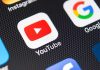 YouTube and Google app icons on a smartphone screen