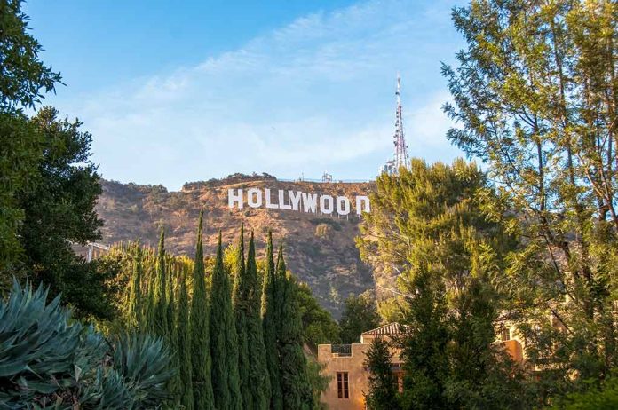 1164563563 featured image Hollywood sign on hill surrounded by trees and buildings