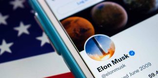 Smartphone showing a Twitter profile American flag background