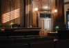 Empty courtroom with judge s bench and wooden decor