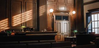 Empty courtroom with judge s bench and wooden decor