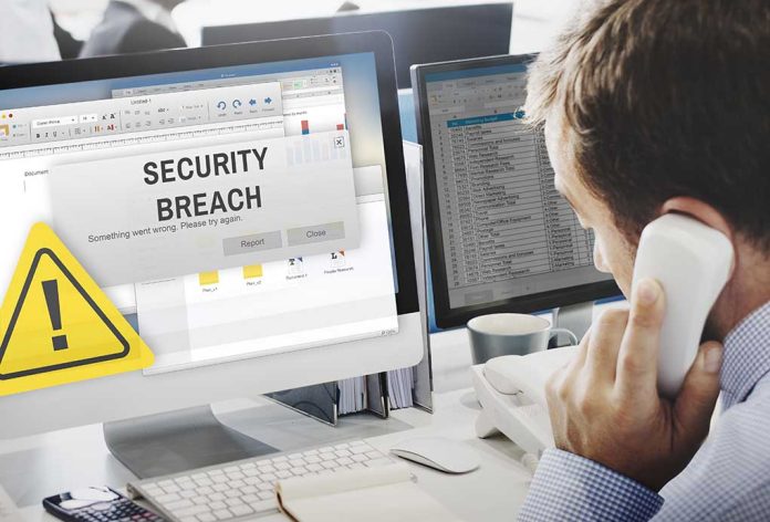 432988318 featured image Security breach alert displayed on computer monitor