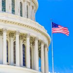 US Capitol building with American flag flying