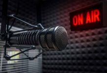 Microphone in soundproof studio with On Air sign