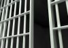 Close-up of prison cell bars