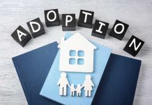 Adoption blocks books house and family paper cutouts