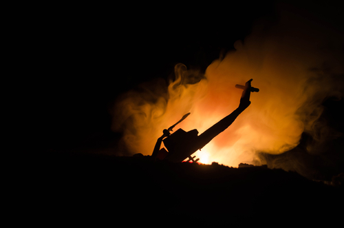 helicopter crash_635424941.jpg featured image Silhouette helicopter with fire and smoke background