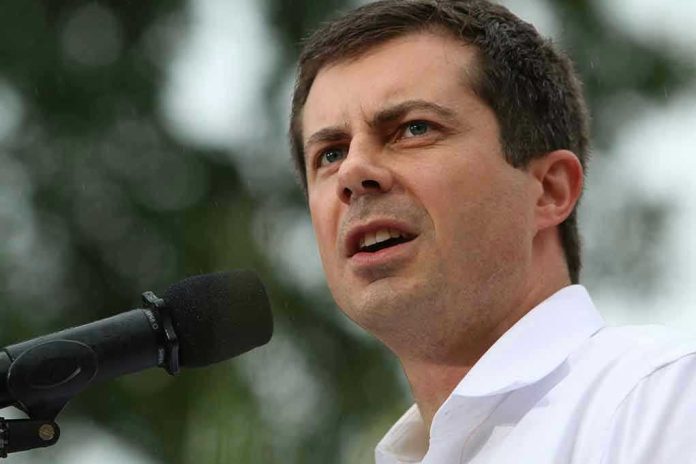 Man speaking into microphone outdoors