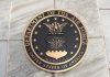Bronze seal of the Department of the Air Force on a tiled surface