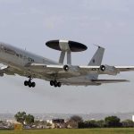 NATO AWACS aircraft taking off from an airfield