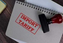 Tariff Uprising Rocks Congress—Trump Blindsided Notebook with Import Tariff stamp and rubber stamper