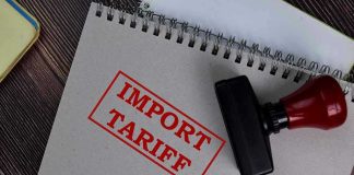 Tariff Uprising Rocks Congress—Trump Blindsided Notebook with Import Tariff stamp and rubber stamper