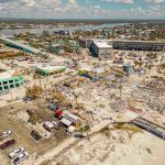 Aerial view of hurricane damaged buildings and debris