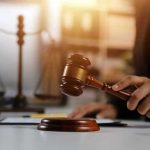 Vindictive Prosecution? Comey Battles Federal Charges Gavel being struck near scales of justice