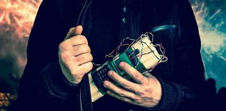 Person holding a homemade explosive device