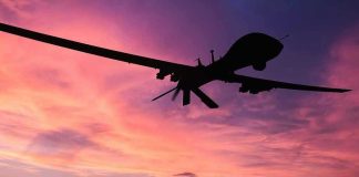 Drone Footage EXPOSES Hamas’ Deceptive Tactics Silhouette of a drone against a colorful sunset