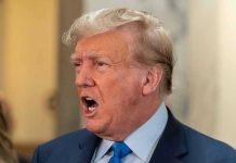 GOP Civil War: Trump Targets Indiana ‘RINOs’ Man in suit with open mouth, speaking passionately.