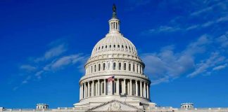 Epstein Files Showdown — Congress Cornered US Capitol Building against blue sky.
