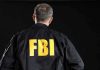 FBI Raids NBA Gambling Den—Nobody Safe FBI agent with back facing the camera