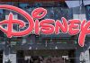 Hollywood Star EXPLODES Over Disney “Fascism” Bright red Disney logo displayed on a storefront window