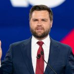 Corruption Found Inside Vances Protection Team Man in a suit speaking at an event.