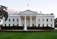 Architect Replaced for Trump’s $300M Ballroom The White House with fountain and American flag.