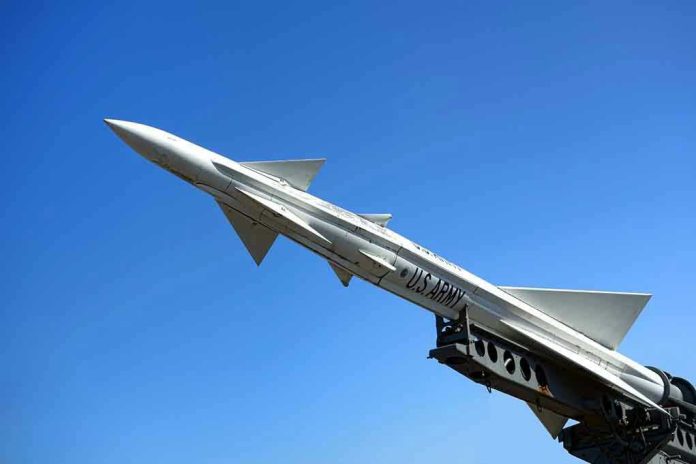 U.S. Army missile against a clear blue sky.