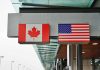 Canada’s $108K Penalty For Staying Alive Canadian and American flags displayed at a border crossing