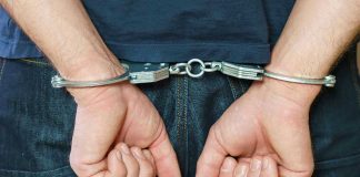 ICE Goes Global—Critics Call It DANGEROUS! Person in handcuffs behind their back.