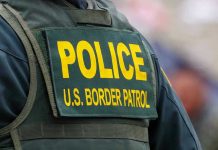 Protester BITES OFF Finger! Police U.S. Border Patrol uniform close-up.