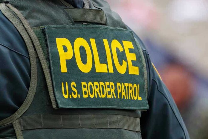 2331437679 Police U.S. Border Patrol uniform close-up.