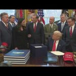Trump signs spending bill ending four-day government