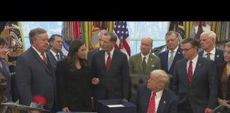 Trump signs spending bill ending four-day government