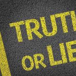 Yellow text on a black surface asking Truth or Lie