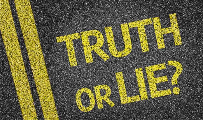 Yellow text on a black surface asking Truth or Lie