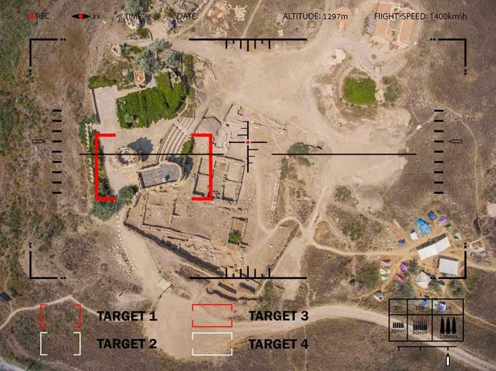 Aerial view through targeting system of ancient ruins.