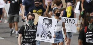 Colorado court orders new trials for 2 paramedics found guilty in death of Elijah McClain