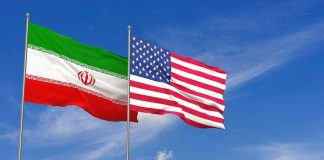 Leader Gone, Power Vacuum Looms Iran and United States flags waving on flagpoles