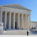 Justice Department Investigates UAW President Supreme Court building with grand columns and steps