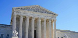 Justice Department Investigates UAW President Supreme Court building with grand columns and steps