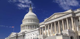 Power Broker Gone — GOP Foreign Policy Wobbles The U.S. Capitol building with its dome and columns under a blue sky