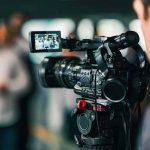 Caught On Camera: Identity Test At Counter Video camera filming a group of people