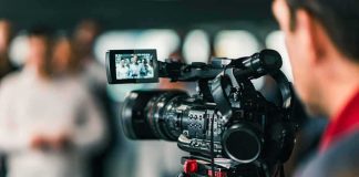 Caught On Camera: Identity Test At Counter Video camera filming a group of people