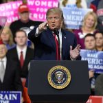 Federal Judge Slaps Trump Voting Order politician speaking at a rally podium