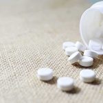Pilot High, 70,000 Pills — Who Missed This? White tablets spilling from a plastic bottle