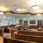 Star Witness Lied—Texas Tosses Verdict Empty courtroom with wooden benches and judge's bench