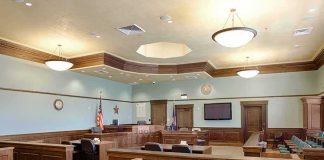 Star Witness Lied—Texas Tosses Verdict Empty courtroom with wooden benches and judge's bench